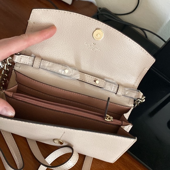 New. Kate spade purse.  Flowers on side.  Very pretty.  Strap. - Picture 6 of 9